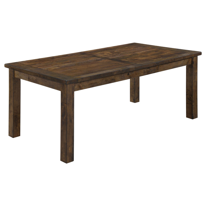 Rustic golden brown Coleman rectangular 79-inch dining table by CoasterEveryday, showcasing sturdy wooden legs and spacious surface.