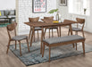 Natural walnut Alfredo 63-inch extension leaf dining table by CoasterEveryday, showing the tabletop with extended leaves and sturdy legs.