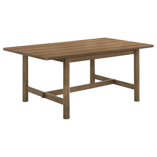 Crestmore 71-inch rectangular walnut wood dining table by CoasterEveryday, showcasing its sleek design and rich wood grain.