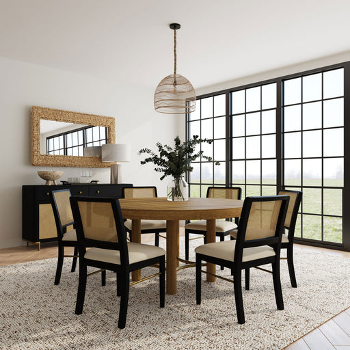 CoasterEveryday Arini 7-piece round dining table set with sand wash and black finish, includes table and matching chairs in a modern furniture design.