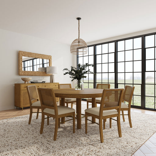 CoasterEveryday Arini 7-piece round dining room table set in sand wash finish, featuring a sturdy table and matching chairs.