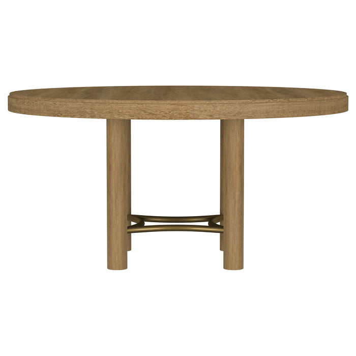 CoasterEveryday Arini 60-inch round wood dining table in sand wash finish, featuring a smooth, natural wood surface and sturdy legs.