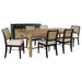 CoasterEveryday Arini 7-piece extension leaf dining table set in sand wash and black, showing the table with extension leaf and chairs.