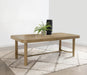 Sand wash Arini 104-inch extension leaf dining table by CoasterEveryday, showing the wooden surface and extended leaves.