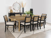 Set of two black Arini Rattan Cane Dining Side Chairs featuring woven rattan seats and cane backs, modern furniture design.