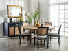 Set of two Arini Rattan Cane Dining Side Chairs in black, modern furniture with woven rattan seats and sleek black frames.
