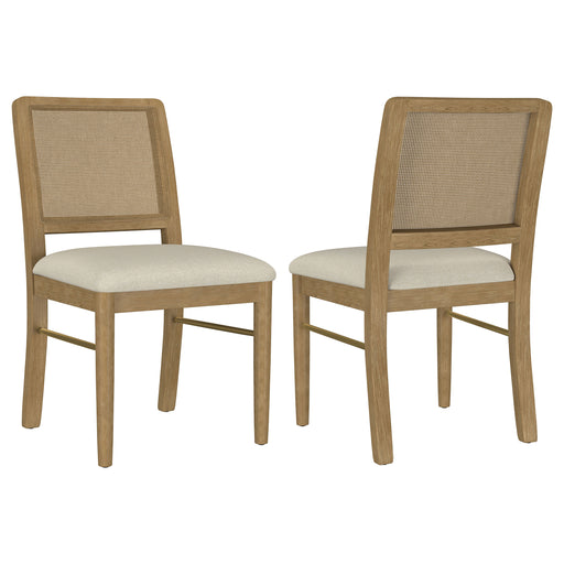 Set of two Arini Rattan Cane Dining Side Chairs in Sand Wash finish, featuring woven rattan seats and curved backrests.