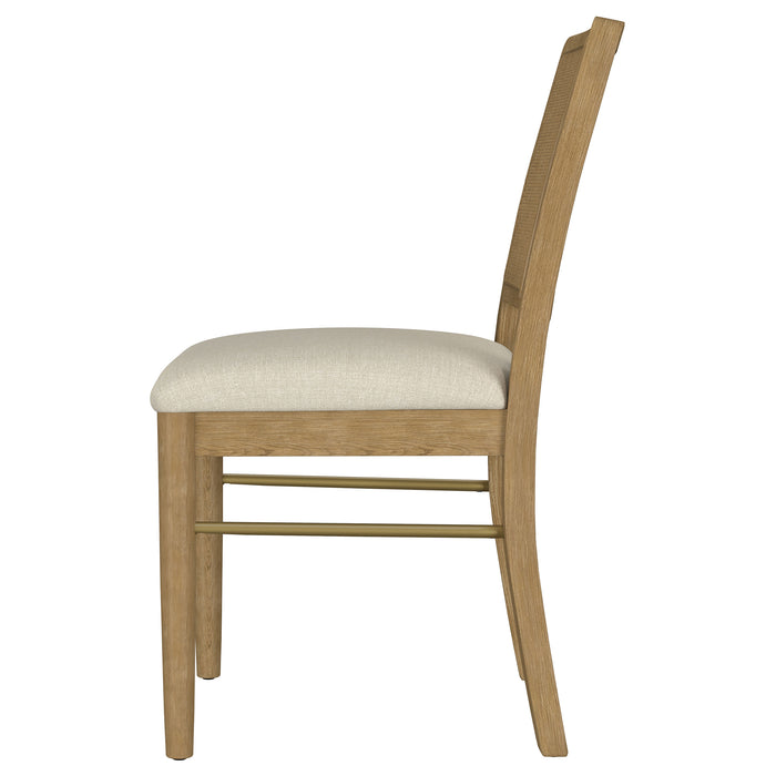 Set of two Arini Rattan Cane Dining Side Chairs in Sand Wash finish, featuring woven cane seats and backrests with wooden legs.