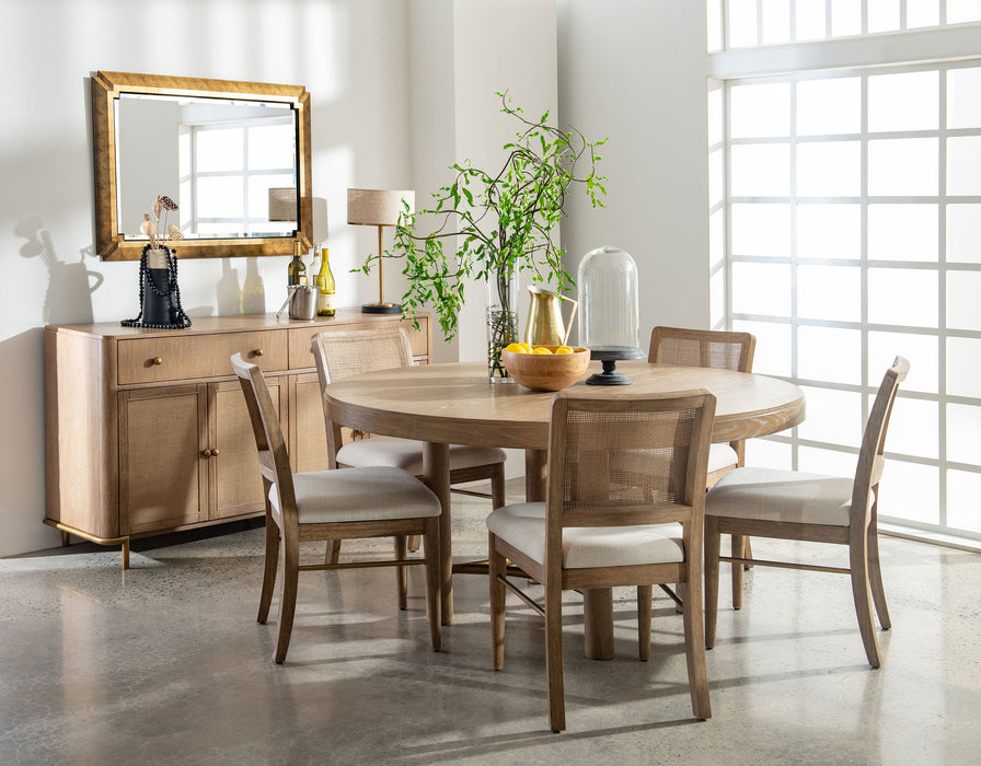 Set of two Arini Rattan Cane Dining Side Chairs in Sand Wash finish, featuring woven cane seats and curved rattan frames.