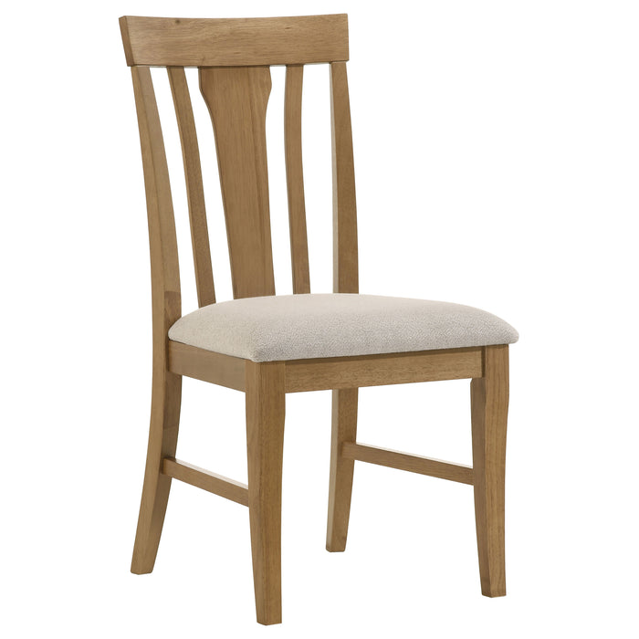 CoasterEveryday Hartville 7-piece round dining table set with natural light brown wooden finish and matching chairs.