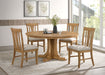 Hartville 60-inch round dining table by CoasterEveryday in natural light brown wood finish, with smooth surface and sturdy legs.