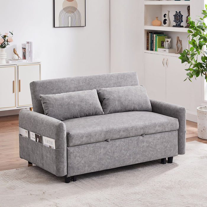 Giga pull-out sleep sofa bed with adjustable backrest, storage pockets, two pillows, and USB ports in a modern living room setting.