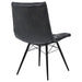 Set of four CoasterEssence Aiken faux leather upholstered dining side chairs in charcoal grey, with padded seats and sleek modern design.