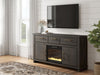 Signature Design by Ashley Brazen Valley TV stand with fireplace option, featuring a modern wood finish and ample storage space.