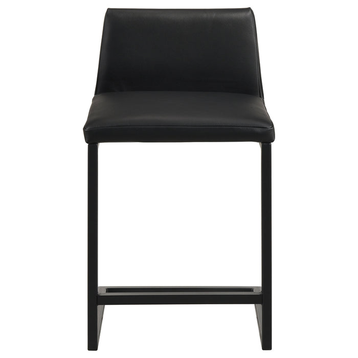 Set of two black Vardon leather counter height chairs by CoasterEveryday, featuring sturdy wooden frames and padded seats.