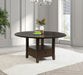 Dark cocoa Twyla 60-inch round dining table with built-in drawer, showcasing a sturdy wooden furniture piece with sleek design.