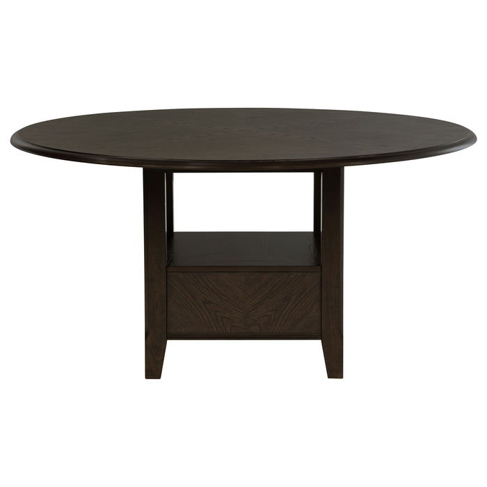 Dark cocoa Twyla 60-inch round dining table with built-in drawer, showcasing smooth wooden surface and sturdy legs.