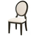 Set of two Twyla oval back dining side chairs by CoasterEssence with dark cocoa finish, showcasing upholstered seats and wooden legs.