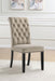 Set of two CoasterEssence Alana velvet upholstered dining side chairs in sand color, featuring cushioned seats and tufted backs.