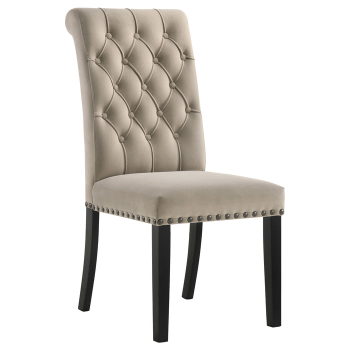 Set of two CoasterEssence Alana velvet upholstered dining side chairs in sand color with sleek wooden legs.