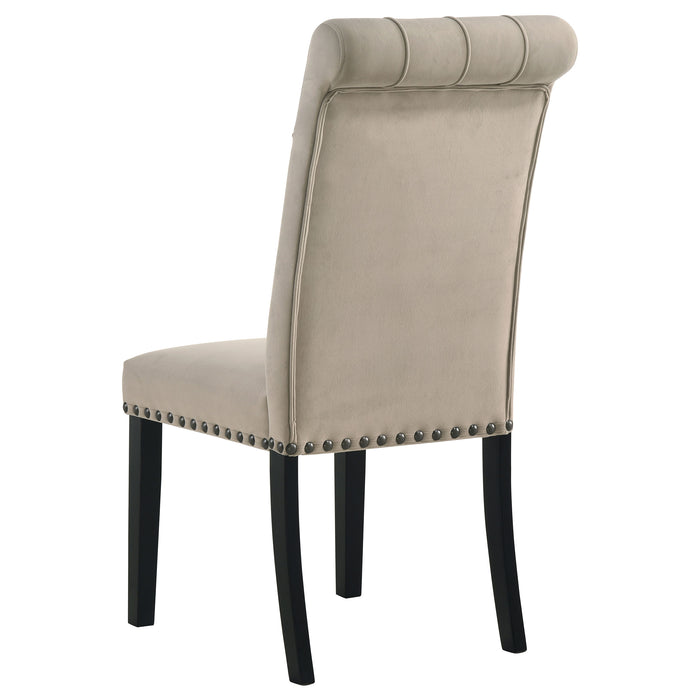 CoasterEssence Alana velvet upholstered dining side chairs in sand color, set of 2, featuring padded seats and elegant wooden legs.