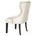 Florence 9-piece 126-inch extension dining table set by CoasterEveryday in distressed black with matching chairs and tabletop extension leaves.