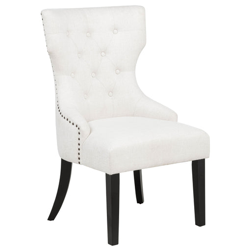 Cream and black fabric upholstered dining side chair from CoasterEveryday with a sleek, modern design and cushioned seat.