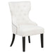 Cream and black fabric upholstered dining side chair from CoasterEveryday with a sleek, modern design and cushioned seat.