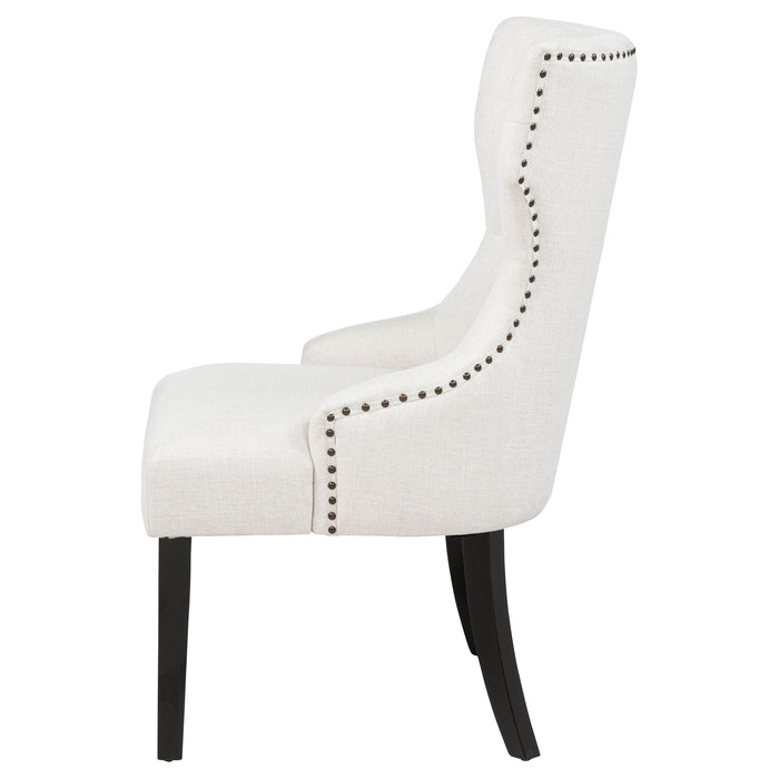 Cream and black fabric upholstered dining side chair with a wooden frame, featuring a modern design by CoasterEveryday.