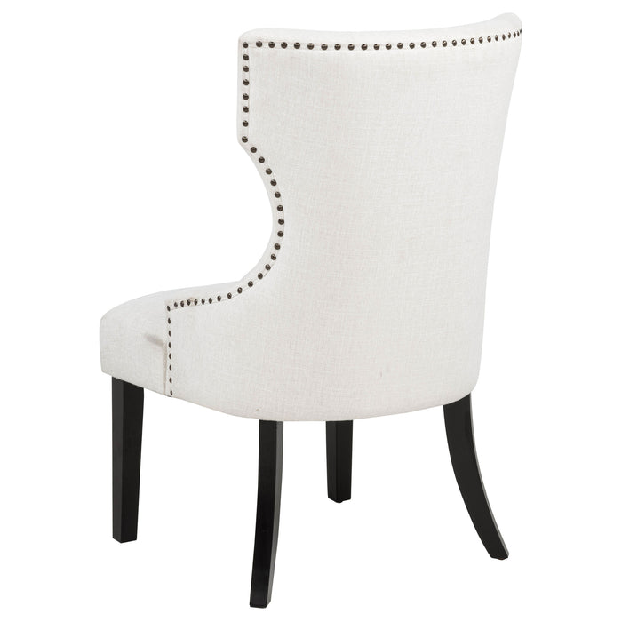 Cream and black fabric upholstered dining side chair with wood legs, modern furniture by CoasterEveryday.