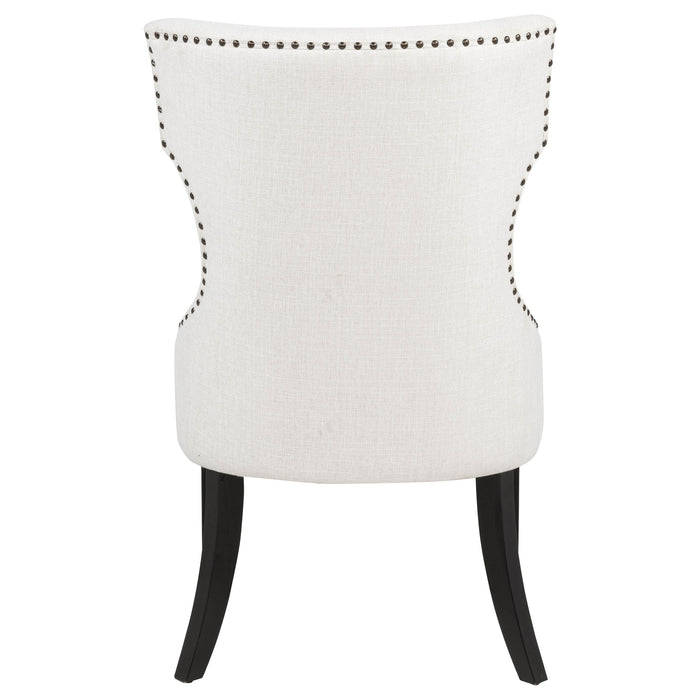 Cream and black Baney fabric upholstered dining side chair by CoasterEveryday with a modern design and cushioned seat.