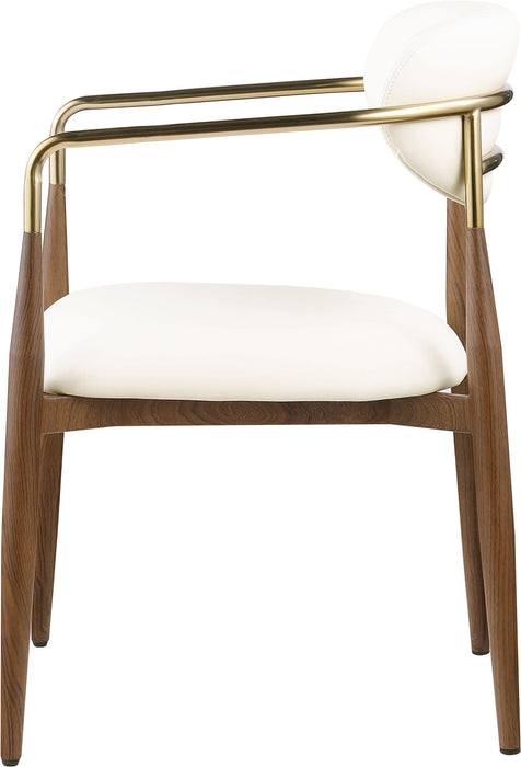 Vegan leather upholstered dining arm chair with walnut wood legs, modern design, from Meridian Furniture.