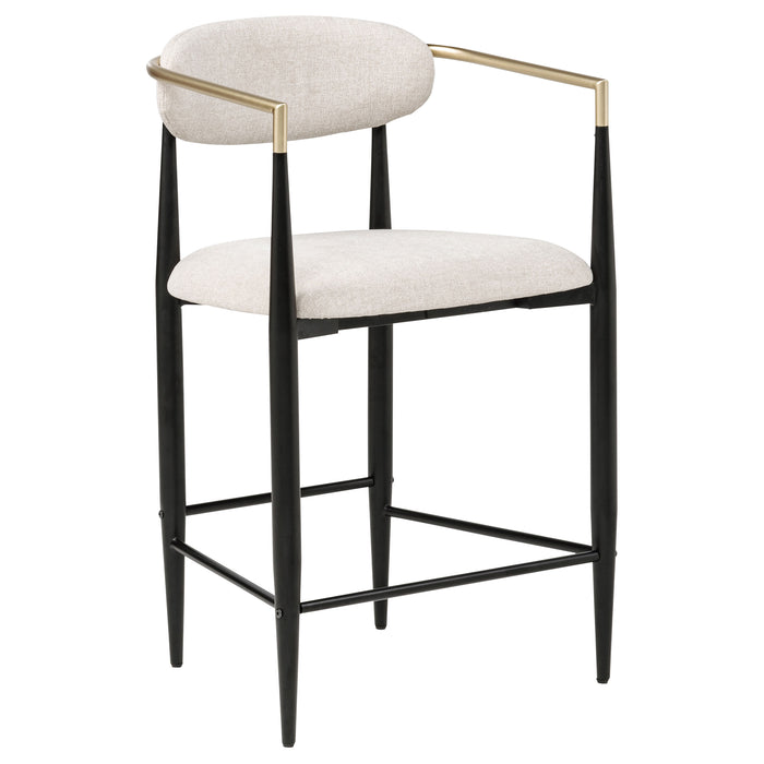 Set of two beige Tina fabric upholstered counter chairs by CoasterEveryday, showing plush padded seats and supportive backrests.