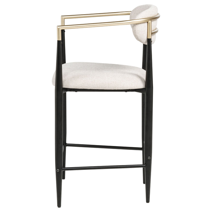 Set of two beige Tina fabric upholstered counter chairs from CoasterEveryday, with padded seats and dark wooden legs.