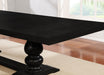 CoasterEssence Phelps 123-inch extension leaf dining table in distressed noir with a wooden finish and sturdy legs.