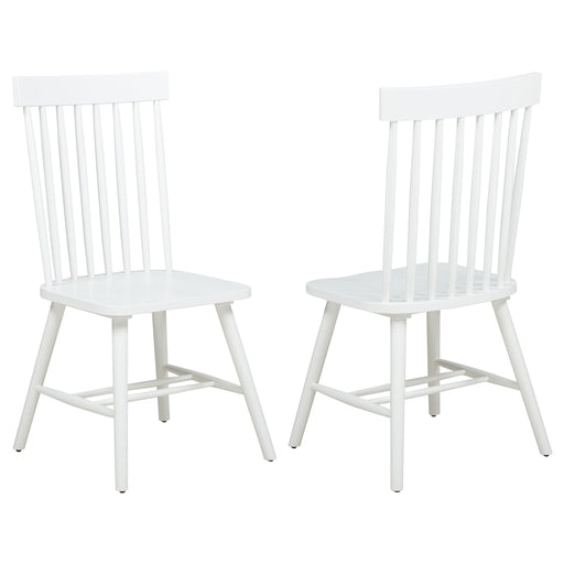 Set of two CoasterEveryday Andrews Windsor spindle back dining side chairs in white with wooden legs, showcasing classic furniture design.