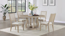 White washed Trofello 5-piece farmhouse round pedestal dining set featuring a table and four matching chairs with curved backs.