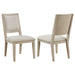 Set of two Trofello upholstered-back dining side chairs in white wash finish, featuring cushioned seats and wooden legs.
