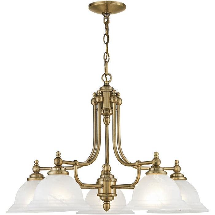 HomeRoots five-light metal chandelier with white shades and antiqued brass finish, featuring dimmable design and elegant lighting style.