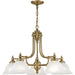 HomeRoots five-light metal chandelier with white shades and antiqued brass finish, featuring dimmable design and elegant lighting style.