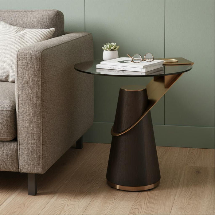 HomeRoots glass and stainless steel round pedestal end table with solid wood top in clear, rose, and gold finish.