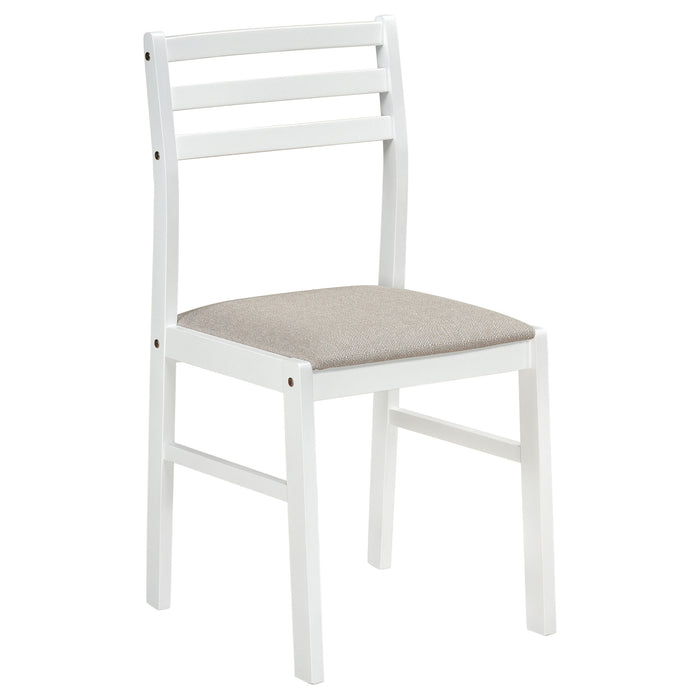 CoasterEveryday Bucknell 3-piece round drop-leaf dining table set in white with matching chairs, showcasing a modern kitchen furniture design.