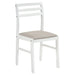 CoasterEveryday Bucknell 3-piece round drop-leaf dining table set in white with matching chairs, showcasing a modern kitchen furniture design.