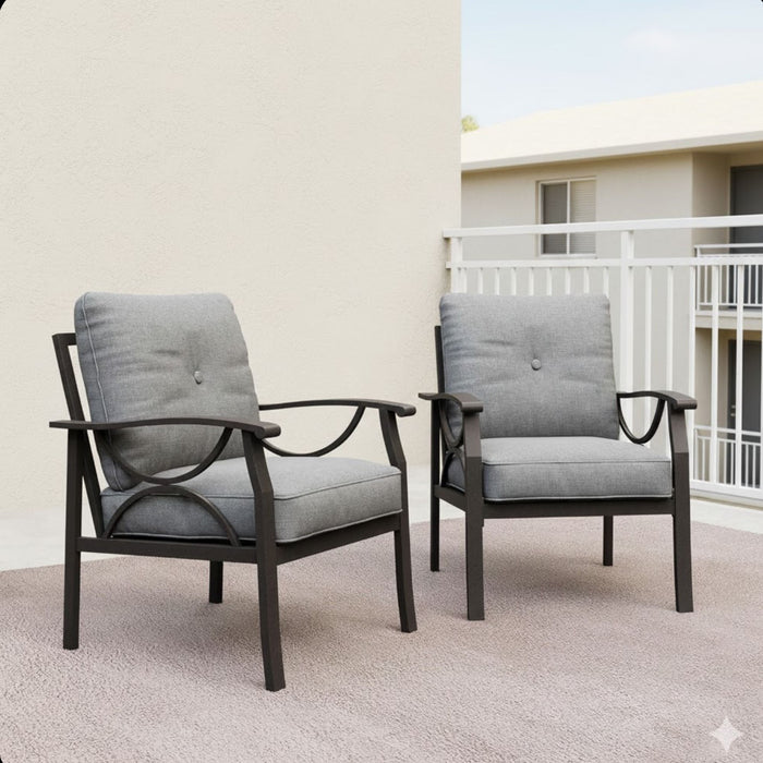 Set of two Giga all-weather armchairs with cushions, sculptural design in gray and khaki outdoor chair sets.
