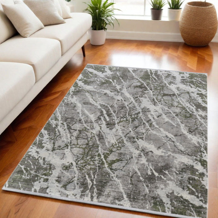 5' X 8' Bohemian Viscose Abstract Power Loom Area Rug With Fringe - Taupe And Gray