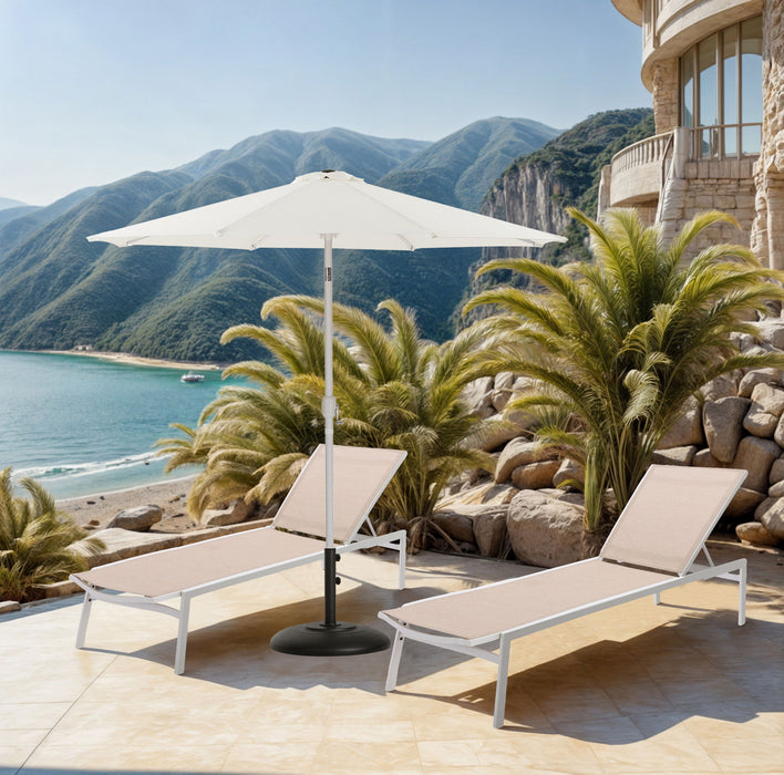 Aluminum patio umbrella with black and white canopy and round base, Meridian Furniture outdoor umbrella for shading patios.