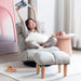 Giga adjustable Japanese reclining floor chair with metal frame, featuring plush upholstery and a matching ottoman for living room comfort.