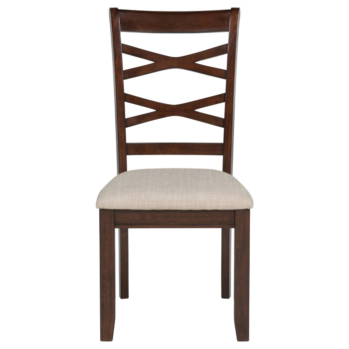 Dark brown CoasterEveryday Barton 5-piece round wood dining table set with matching chairs, showcasing a stylish and sturdy furniture design.
