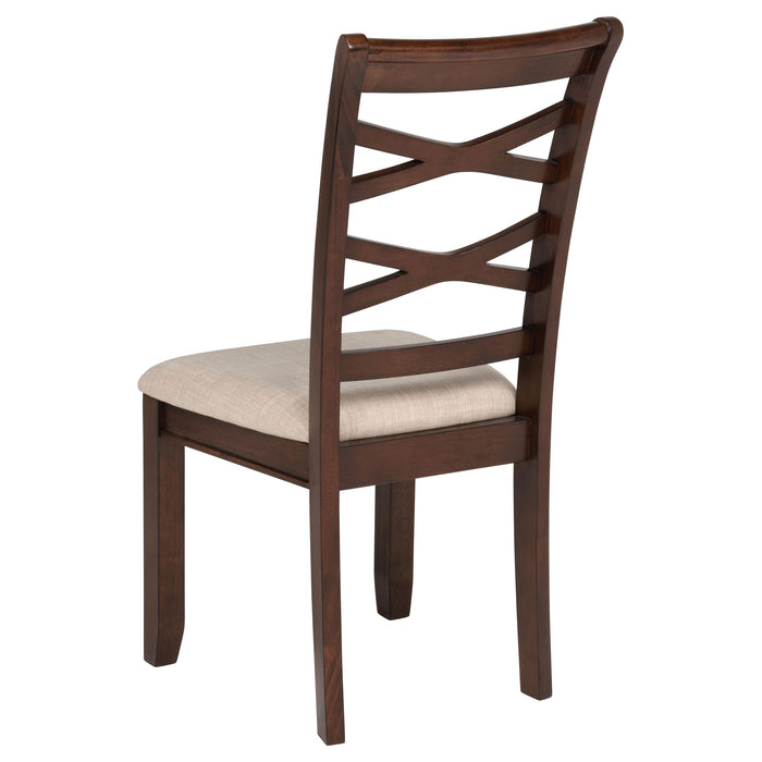 CoasterEveryday Barton 5-piece round wood dining table set in dark brown with matching chairs, showcasing a modern dining furniture arrangement.