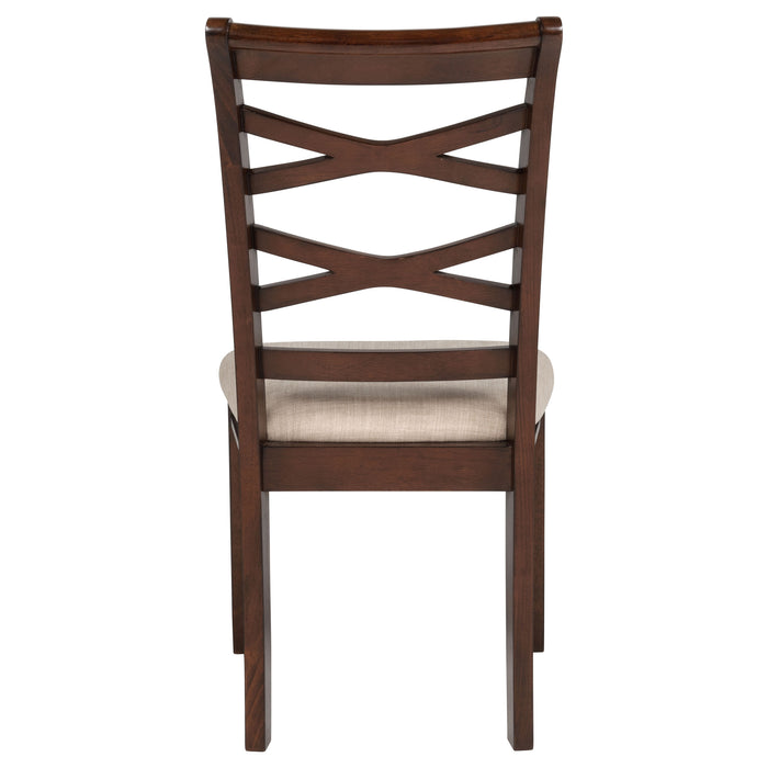 CoasterEveryday Barton 5-piece round wood dining table set with dark brown finish, including table and matching chairs.